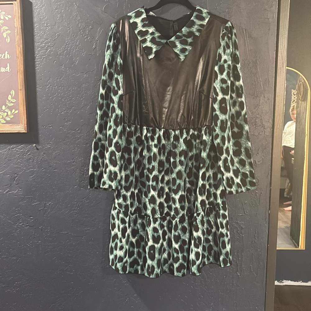 Green leopard print with faux leather top.